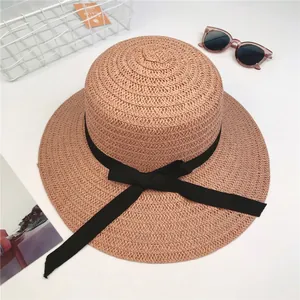 Foldable wide brim straw sun hat with black ribbon bow for women summer beach style