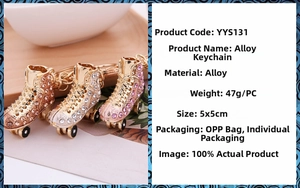 Detail view of rhinestone-encrusted alloy roller skate keychain set with product specs