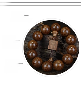 Detailed view of high-density natural wood prayer beads with smooth hand-polished finish