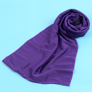 Close-up of purple cooling sports towel with breathable mesh texture on blue background