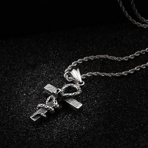 Gothic silver stainless steel cross necklace with snake wrap on black stone