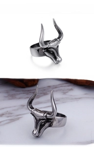 Macro detail of retro punk bull head ring in vintage finish titanium steel jewelry