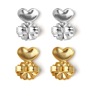 Detailed view of heart-shaped earring lifters in polished gold and silver finishes