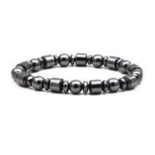 Detail shot of magnetic hematite bracelet with alternating round and cylindrical beads