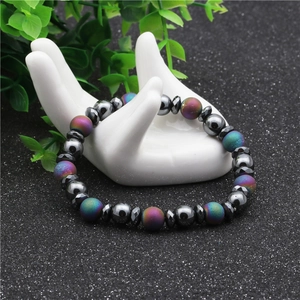 8mm hematite beaded bracelet with rainbow frosted stones on a white hand display stand