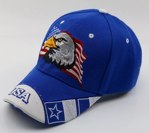 Detail of embroidered eagle and USA flag on a blue adjustable cotton baseball cap