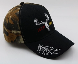 Detailed side view of baseball cap featuring deer skull embroidery and camouflage mesh panels