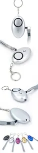 Close-up of portable safety alarms in five metallic colors with metal keychains