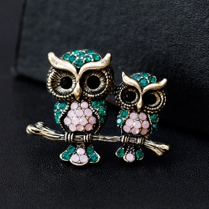 Vintage owl brooch with pink opal and green rhinestones on bronze branch for suits
