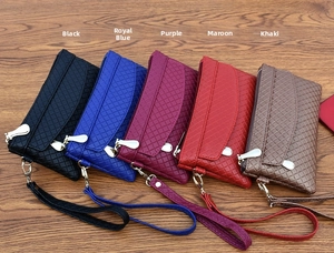 Detail showing woven texture purses with wristlets in black, blue, purple, red, and khaki