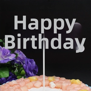 Silver glitter Happy Birthday cake topper with heart design and marshmallow detail