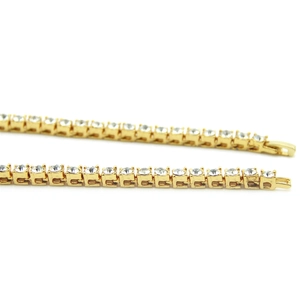 Detail of 5mm gold hip hop tennis chain showing secure clasp and clear stone setting