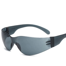 Detail shot of smoke gray impact-resistant cycling glasses with durable polycarbonate frame