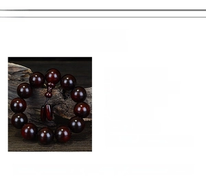 Detailed view of 20mm Indian Sandalwood beads with rich oily texture and 12-bead layout