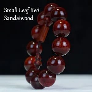 Blood Sandalwood beaded bracelet with deep red glossy finish and fine wood texture