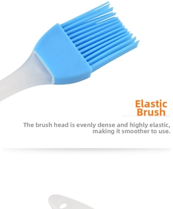 Close-up of blue silicone oil brush with fine bristles and translucent PP handle for BBQ