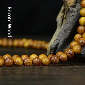 Bracelet bouddhiste en bois de santal doré avec 108 perles et grain naturel poli