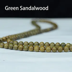 Bracelet mala 108 perles en bois de santal vert d'Argentine avec grain naturel