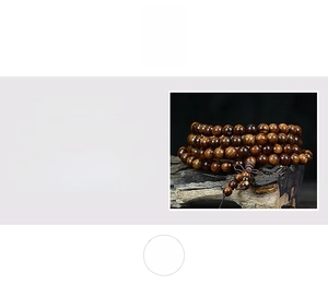 Macro detail of high-density dark rosewood beads showing natural grain and texture