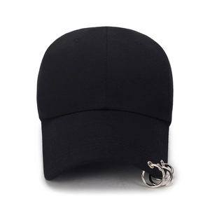 Classic black cotton baseball cap with three silver metal rings on the brim for street style