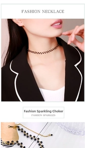 Close-up of double-row black bead choker necklace with gold chain on model and surface
