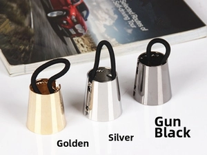 Detailed set of three metallic ponytail cuffs in gold, silver, and gun black finishes