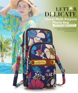 Detail of floral pattern phone armband with dual zippers for outdoor sports and running