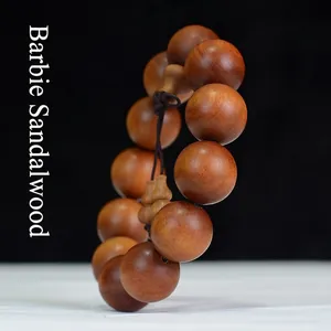 Authentic Bubinga wood Buddhist bracelet with 12 large round beads in deep reddish brown