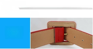 Close-up of red leather belt detail showing square metal buckle and neat stitching