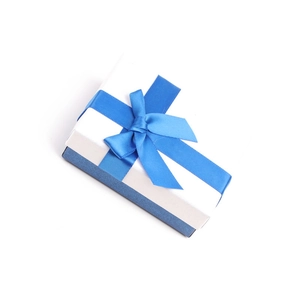 Elegant square gift box with white lid and dark blue base featuring a blue silk ribbon bow