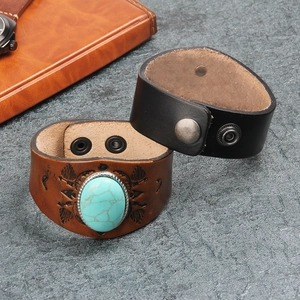 Ethnic wide leather cuff bracelet set with turquoise stone and etched metal accents