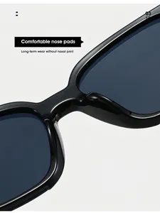 Detail der integrierten Nasenpads an der schwarzen Acetat-Sonnenbrille für perfekten Sitz