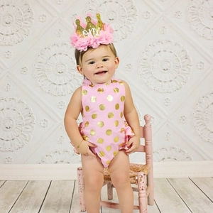 Pink and gold baby girl first birthday outfit with bodysuit and crown headband