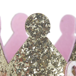 Detail of gold glitter crown with pink felt lining for children party celebrations