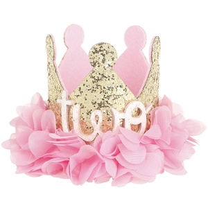 Detail of pink mesh and gold glitter crown with two lettering for baby 2nd birthday