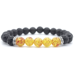 8mm black lava stone bracelet with amber resin beads and silver spacers on white background