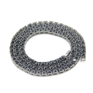 Detailed view of coiled 5mm black rhinestone tennis necklace with secure clasp closure