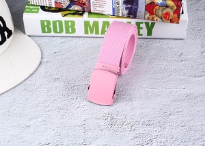 Detailed 45-degree angle of pink canvas belt with matching smooth matte finish buckle