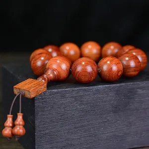 Burmesisches Rosenholz Armband mit natürlicher Maserung und Holzanhänger Dekor