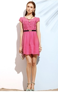 Pink short-sleeve lace dress featuring a delicate floral pattern and slim black belt