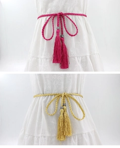 Detailed close-up of handmade woven tassel waist ropes with silver beads and knot detail