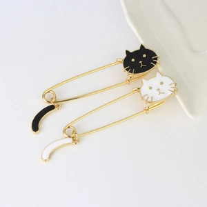 Cute Japanese cartoon cat enamel pins set featuring black and white cats with swinging tails