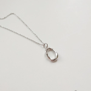 Minimalist 925 sterling silver necklace featuring an irregular molten lava oval pendant