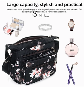 Macro view of nylon crossbody bag showing multiple zip compartments and floral pattern