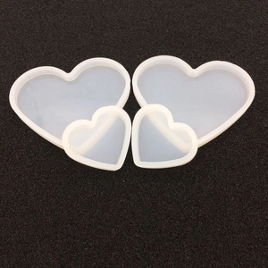 Detail of translucent heart silicone molds for DIY resin casting and jewelry making