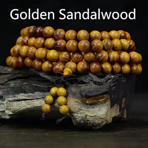 Bracelet bouddhiste en bois de santal doré avec 108 perles et texture naturelle