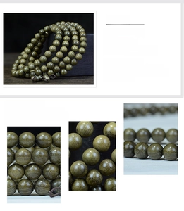 Macro detail of natural golden silk phoebe wood beads showing fine grain and oily texture