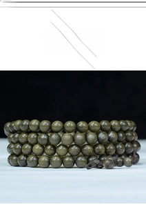Detailed view of 108 dark green Phoebe zhennan wood beads with traditional Chinese knot