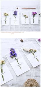 Detail view of handmade greeting cards featuring real dried flowers and wood background