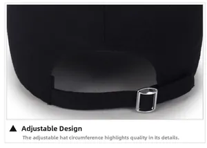 Detail view of the adjustable metal buckle and strap on back of black cotton baseball cap
